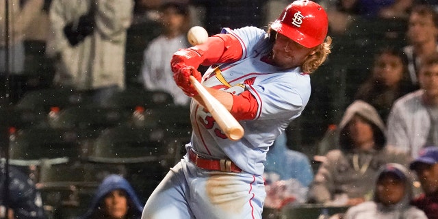 Brendan Donovan #33 of the St. Louis Cardinals hits a two RBI double during the tenth inning of Game Two of a doubleheader against the Chicago Cubs at Wrigley Field on June 04, 2022 in Chicago, Illinois. The Cardinals defeated the Cubs 7-4.