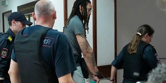 WNBA star and two-time Olympic gold medalist Brittney Griner leaves a courtroom after a hearing in Khimki just outside Moscow, Russia, Monday, June 27, 2022.