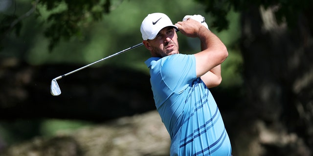 Brooks Koepka of the United States plays his shot from the sixth tee during a practice round prior to the 2022 U.S. Open at The Country Club on June 13, 2022 in Brookline, Massachusetts.