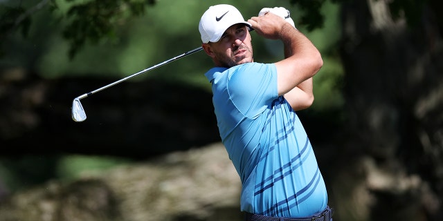 Brooks Koepka of the United States plays his shot from the sixth tee during a practice round prior to the 2022 U.S. Open at The Country Club on June 13, 2022 in Brookline, Massachusetts.