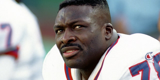 Buffalo Bills defensive lineman Bruce Smith # 78 is on the sidelines during a match against the New York Jets at the Giants Stadium in East Rutherford, NJ on October 24, 1993.