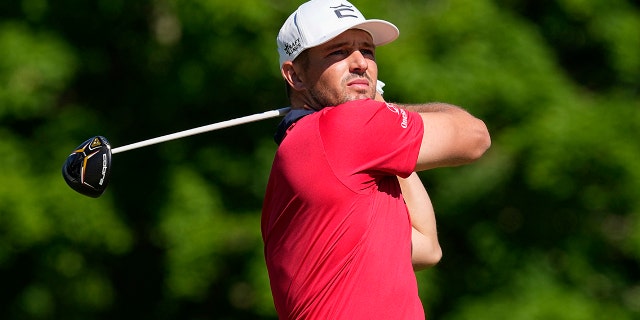 Bryson DeChambeau hits from the 18th tee during the Memorial golf tournament Friday, June 3, 2022, in Dublin, Ohio.