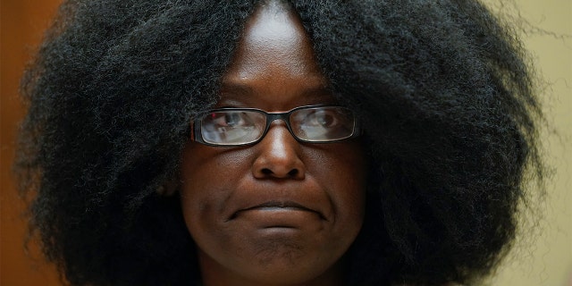 Zeneta Everhart, whose son Zaire Goodman, 20, was shot in the neck during the Buffalo Tops supermarket mass shooting and survived, testifies during a House Committee on Oversight and Reform hearing on gun violence on Capitol Hill in Washington, Wednesday, June 8, 2022. 