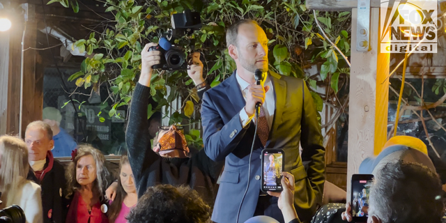 Then-San Francisco District Attorney Chesa Boudin speaks to a crowd of supporters at his recall election party in San Francisco. 