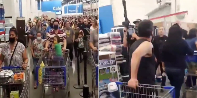 Shoppers are seen being escorted out of a Sam's Club store in Fullerton, California on Wednesday.