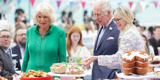 Prince Charles wore a pinstriped suit, while Camilla opted for a bold green dress for the afternoon out on the final day of the queen's jubilee events on June 5.