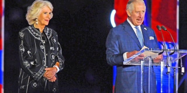 Camilla, Duchess of Cornwall and Prince Charles are seen on stage during the Platinum Party At The Palace at Buckingham Palace on June 4, 2022 in London, England. The Platinum Jubilee of Elizabeth II is being celebrated from June 2 to June 5, 2022, in the UK and Commonwealth to mark the 70th anniversary of the accession of Queen Elizabeth II on 6 February 1952.