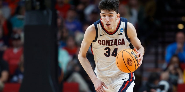 Gonzaga center Chet Holmgren brings the ball up against Georgia State during the second half of a first-round NCAA college basketball tournament game March 17, 2022, in Portland, Ore.