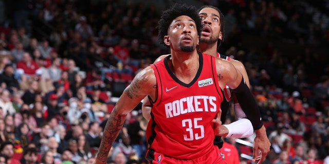 Christian Wood #35 of the Houston Rockets looks for the rebound during the game against the Portland Trail Blazers on March 26, 2022 at the Moda Center Arena in Portland, Oregon. 