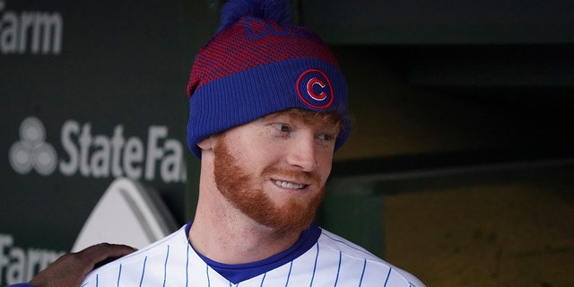 Clint Frazier of the Chicago Cubs stands in the dugout before a game against the St. Louis Cardinals at Wrigley Field on June 4, 2022 in Chicago.