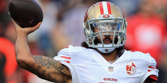 Colin Kaepernick of the San Francisco 49ers throws a pass during the first half against the Los Angeles Rams at the Los Angeles Memorial Coliseum on December 24, 2016 in Los Angeles. 