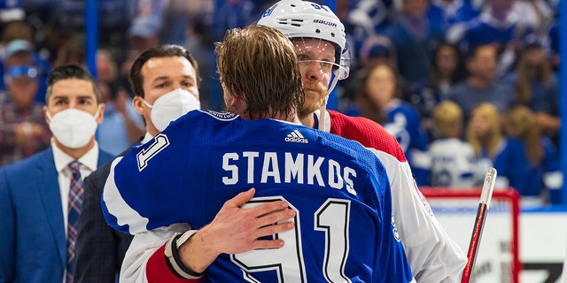 Steven Stamkos #91 of the Tampa Bay Lightning shakes hands with Corey Perry #94 of the Montreal Canadiens after the Tampa Bay Lightning defeated the Montreal Canadiens in Game Five to win the best of seven game series 4-1 during the Stanley Cup Final of the 2021 Stanley Cup Playoffs at Amalie Arena on July 7, 2021 in Tampa, Florida.