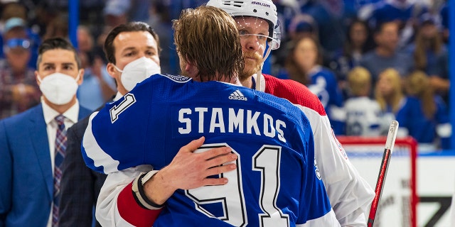 Steven Stamkos #91 of the Tampa Bay Lightning shakes hands with Corey Perry #94 of the Montreal Canadiens after the Tampa Bay Lightning defeated the Montreal Canadiens in Game Five to win the best of seven game series 4-1 during the Stanley Cup Final of the 2021 Stanley Cup Playoffs at Amalie Arena on July 7, 2021 in Tampa, Florida.