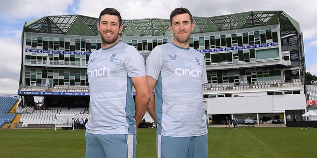 Twin brothers Craig (R) and Jamie Overton pose for a photo during netting ahead of the third Test Match between England and New Zealand at Headingley on June 21, 2022 in Leeds, England.