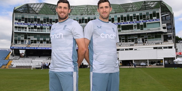 Twin brothers Craig (R) and Jamie Overton take pictures online prior to their third UK-New Zealand test match at Headingley on June 21, 2022 in Leeds, England. increase.