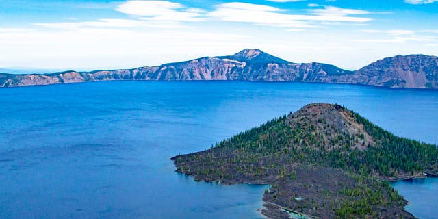 Crater Lake National Park, Oregon, is one of America's oldest national parks. Wizard Island, Crater Lake, from Discovery Point.