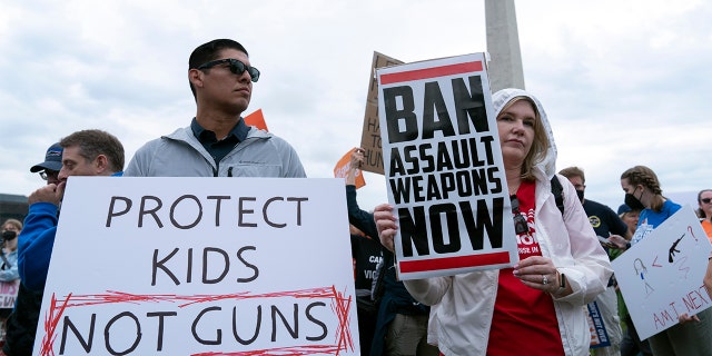 People participate in the second March for Our Lives rally in support of gun control in front of the Washington Monument, Saturday, June 11, 2022, in Washington. (AP Photo/Jose Luis Magana)