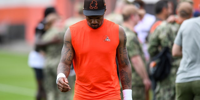Deshaun Watson #4 of the Cleveland Browns walks off the field after the Cleveland Browns OTAs at CrossCountry Mortgage Campus on May 25, 2022 in Berea, Ohio.