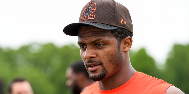 Deshaun Watson of the Cleveland Browns walks off the field after the Cleveland Browns' OTA at the Crosscountry Mortgage Campus on May 25, 2022 in Berea, Ohio.
