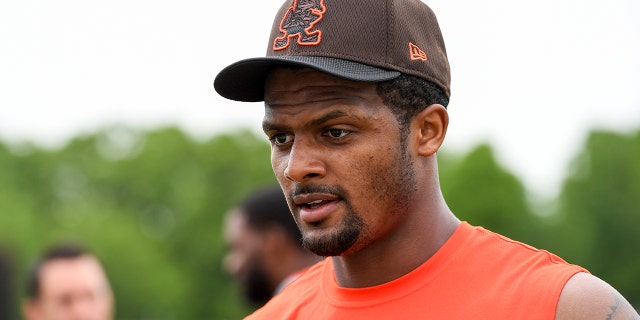 Deshaun Watson #4 of the Cleveland Browns walks off the field after the Cleveland Browns OTAs at CrossCountry Mortgage Campus on May 25, 2022 in Berea, Ohio.