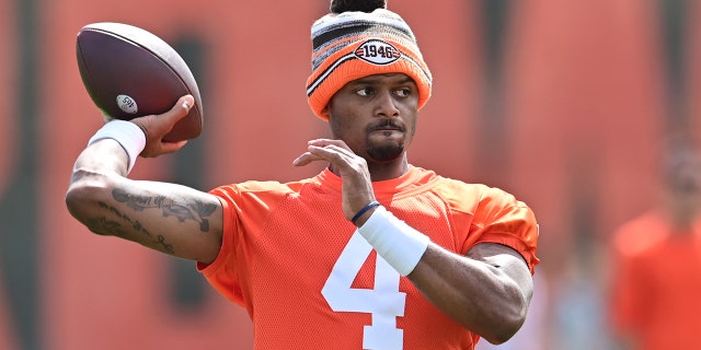 Cleveland Browns quarterback Deshaun Watson (4) throws a pass during organized team activities at CrossCountry Mortgage Campus May 25, 2022, in Berea, Ohio.