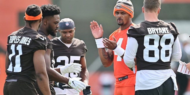 Cleveland Browns quarterback Deshaun Watson (4) calls a play with the offense during organized team activities at CrossCountry Mortgage Campus May 25, 2022, in Berea, Ohio.