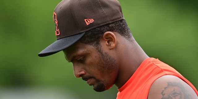 May 25, 2022; Berea, OH, USA; Cleveland Browns quarterback Deshaun Watson (4) walks off the field during organized team activities at CrossCountry Mortgage Campus.