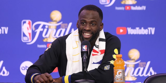 Draymond Green of the Golden State Warriors talks to the media after the NBA Finals game on June 8, 2022, in Boston.