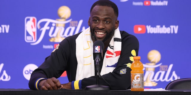 Draymond Green of the Golden State Warriors talks to the media after the NBA Finals game on June 8, 2022, in Boston.