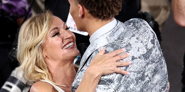 Dyson Daniels hugs his mother after being drafted 8th overall by the New Orleans Pelicans during the 2022 NBA Draft at Barclays Center on June 23, 2022 in New York City.