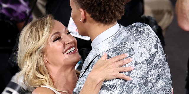 Dyson Daniels hugs his mother after being drafted 8th overall by the New Orleans Pelicans during the 2022 NBA Draft at Barclays Center on June 23, 2022 in New York City.