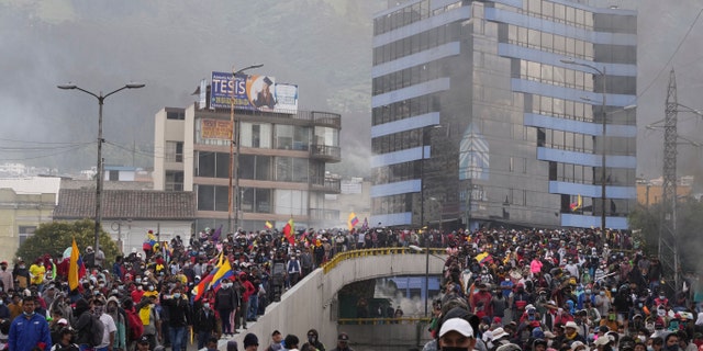 Demonstrators protest against the government of President Guillermo Lasso and rising fuel prices in Quito, Ecuador, Tuesday, June 1, 202. Ecuador's defense minister2 warned Tuesday that the country's democracy was at risk as the demonstrations turned increasingly violent in the capital.