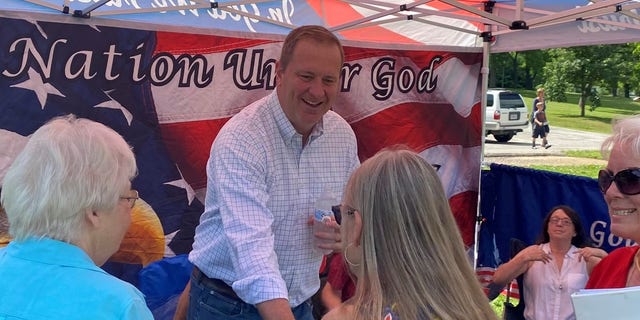 Republican Attorney General Eric Schmitt of Missouri, a leading contender for the state's GOP Senate nomination, greets voters at the Texas County and Shannon County Lincoln Days gathering, on June 11, 2022 