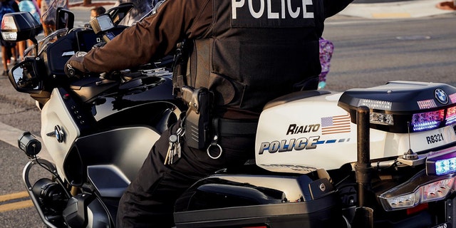 A Rialto Police Department officer on a motorcycle. 