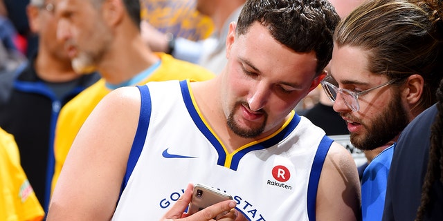 A fan dresses as Klay Thompson during the 2018 NBA playoffs May 20, 2018 before Game 4 of the Western Conference Finals at Oracle Arena in Oakland, Calif.