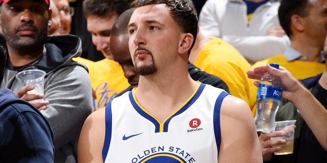 A fan dressed as Klay Thompson watches the Western Conference Finals during the NBA playoffs on May 20, 2018, in Oakland, California.