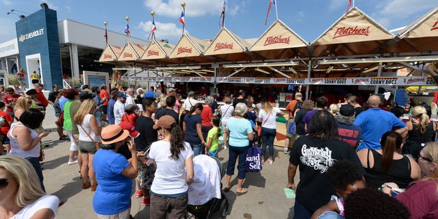 Neil and Carl Fletcher began selling corn dogs — or corny dogs, in their parlance — at the State Fair of Texas in 1942. The Fletcher family today sells as many as 600,000 corny dogs at the fair each autumn.