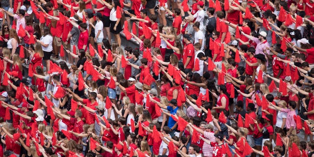 "Glory, Glory" is a beloved tradition in University of George football, set to the tune of "The Battle Hymn of the Republic." Fans reverently point to a trumpet soloist who introduces the song before each home game.