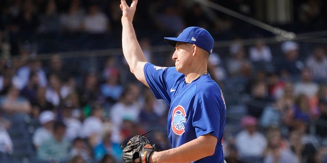 Chicago Cubs first baseman Frank Schwindel pitches against the New York Yankees, Sunday, June 12, 2022, in New York.