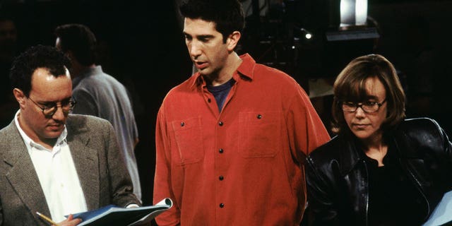 Executive Producer David Crane, left, and David Schwimmer directing an episode of "Friends" with executive producer Marta Kauffman.