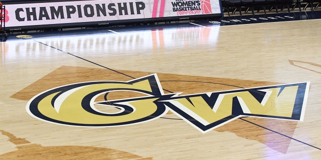 The George Washington Colonials' logo on the floor before a first-round Atlantic 10 women's basketball tournament game against the Richmond Spiders at the Smith Center March 3, 2020, in Washington, D.C.