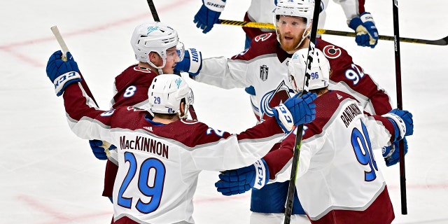 Gabriel Landeskog (92) of the Colorado Avalanche celebrates with teammates after a goal against the Tampa Bay Lightning during the second period in Game 4 of the 2022 NHL Stanley Cup Final at Amalie Arena June 22, 2022, in Tampa, Fla.