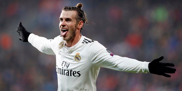 Real Madrid midfielder Gareth Bale celebrates after scoring his side's fourth goal during the Champions League Group G match between Real Madrid and Viktoria Plzen at the Doosan arena in Pilsen, Czech Republic, Nov. 7, 2018.