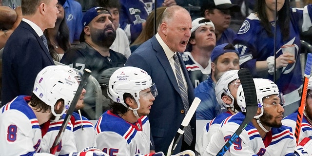 New York Rangers head coach Gerard Gallant yells to his players during the second period in Game 4 of the NHL Hockey Stanley Cup playoffs Eastern Conference finals against the Tampa Bay Lightning, Tuesday, June 7, 2022, in Tampa, Fla.