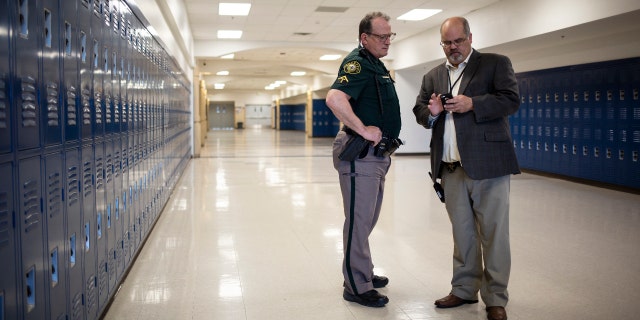 An officer at Columbine High School in 2019.