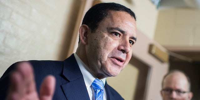 Rep. Henry Cuellar, D-Texas, talks with reporters in the Capitol after a meeting of House Democrats on Thursday, June 27, 2019.