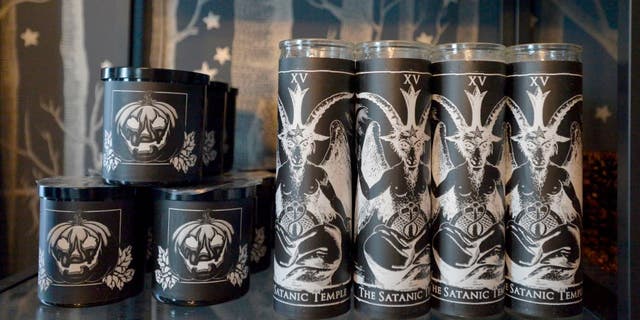 Candles are seen for sale at the headquarters of The Satanic Temple in Salem, Massachusetts, on Oct. 8, 2019.