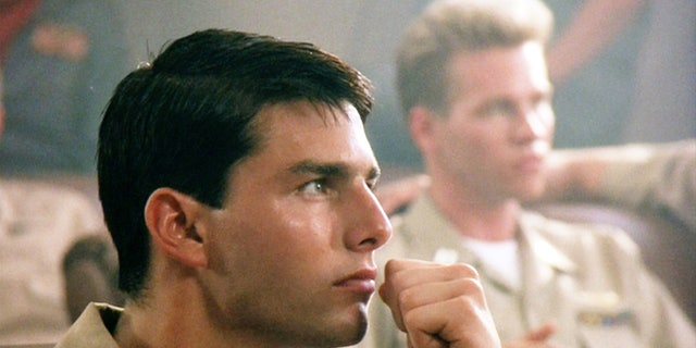 "Top Gun", directed by Tony Scott. Tom Cruise as Lt. Pete "Maverick" Mitchell and Val Kilmer as Lt. Tom 'Iceman' Kazansky in the background.