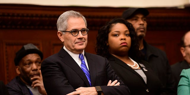 PHILADELPHIA, PA - DECEMBER 30:   (L) Philadelphia District Attorney Larry Krasner reacts while being mentioned by Danielle Outlaw at a press conference announcing her as the new Police Commissioner on December 30, 2019 in Philadelphia, Pennsylvania. 