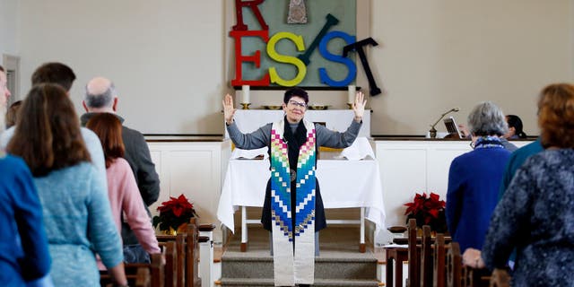 Rev. Cynthia Good, pastor at Calvary United Methodist Church in Arlington, Mass., speaks to her church during Sunday services Jan. 5, 2020.